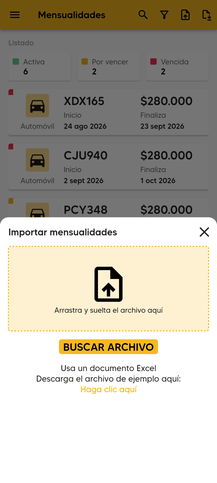 Ventana Importar mensualidades con la zona Arrastra y suelta el archivo aquí (en la web), el botón BUSCAR ARCHIVO, el texto Usa un documento Excel y el enlace Haga clic aquí para descargar el archivo de ejemplo.
