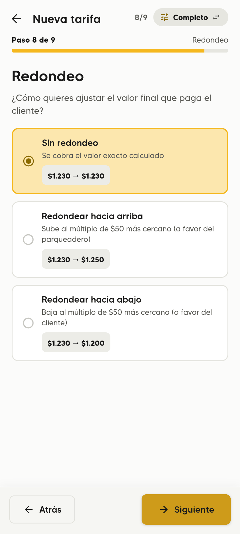 Paso 8 de 9, Redondeo, con Sin redondeo elegido y las opciones Redondear hacia arriba y Redondear hacia abajo con ejemplos de $1.230.